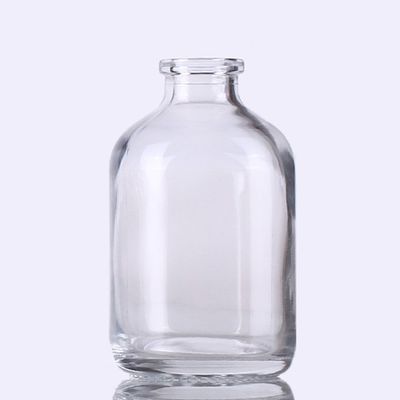 50 ml Un vial de vidrio transparente moldeado USP tipo II con cuello de 20 mm